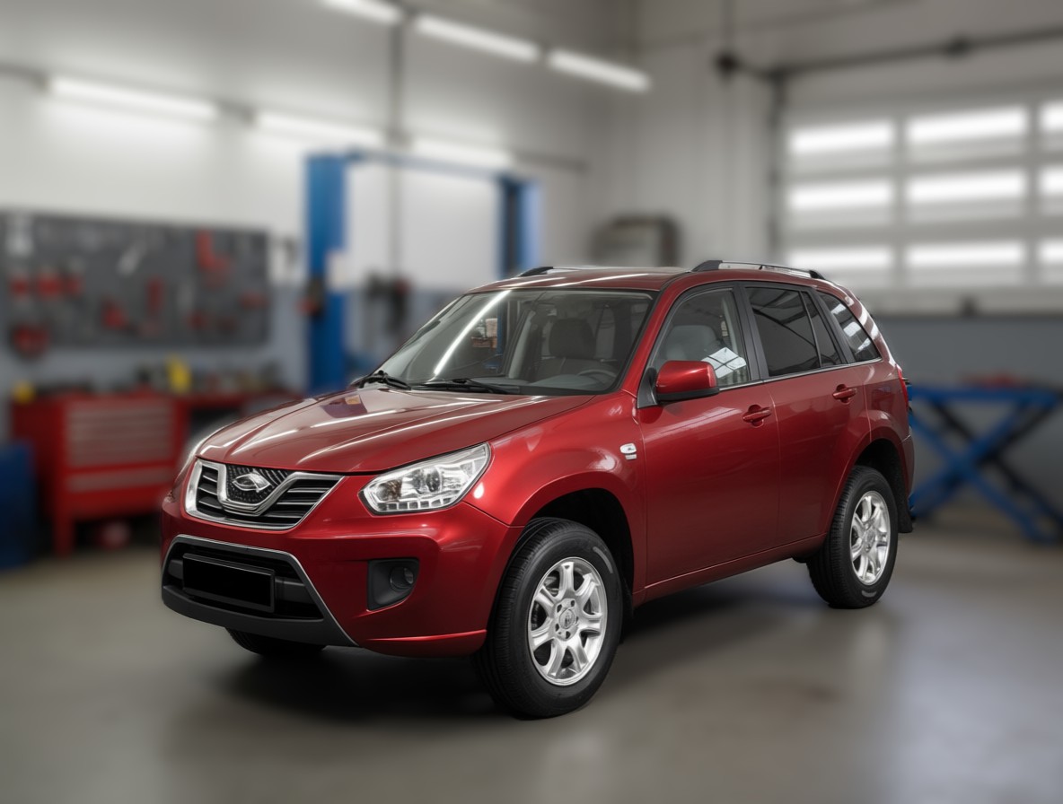 Chery Tiggo T11 готовится к замене масла в двигателе в автотехцентре