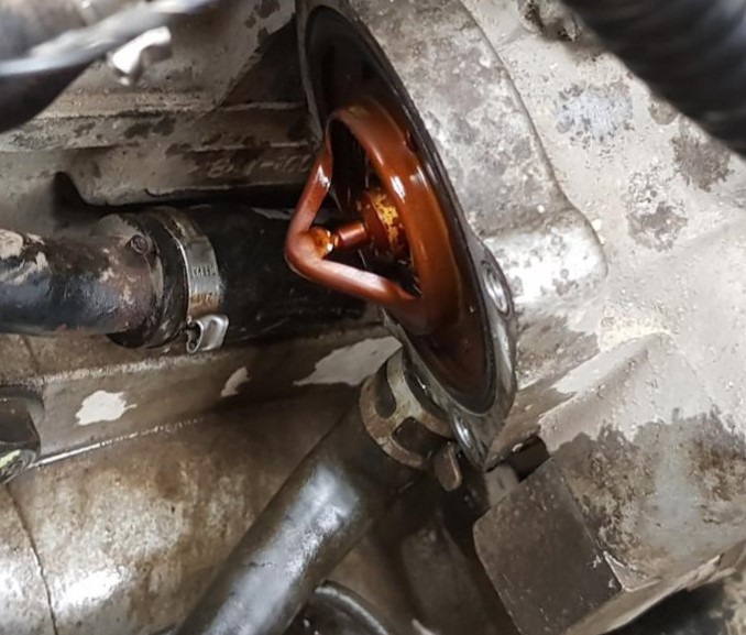 замена термостата чери